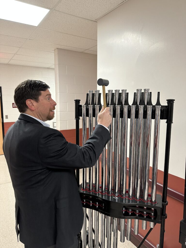 Mr H playing chimes